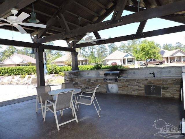 3842 James Stovall St, Pensacola, FL 32526 - view of patio with a gazebo, an outdoor kitchen, outdoor dining space, and ceiling fan