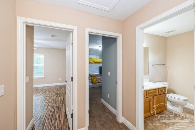 2172 Hadleigh Hills Ct, Navarre, FL 32566 - hall featuring baseboards