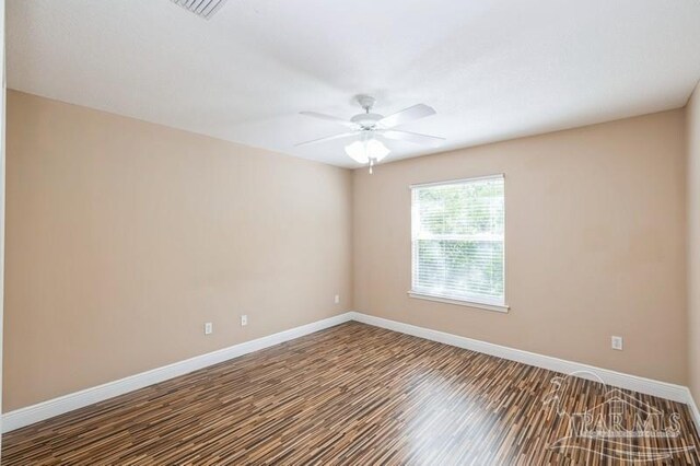 2172 Hadleigh Hills Ct, Navarre, FL 32566 - unfurnished room featuring a ceiling fan and wood finished floors