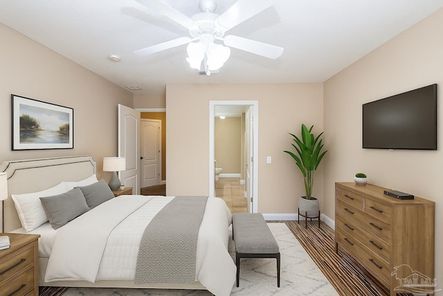 2172 Hadleigh Hills Ct, Navarre, FL 32566 - bedroom featuring ensuite bath and a ceiling fan