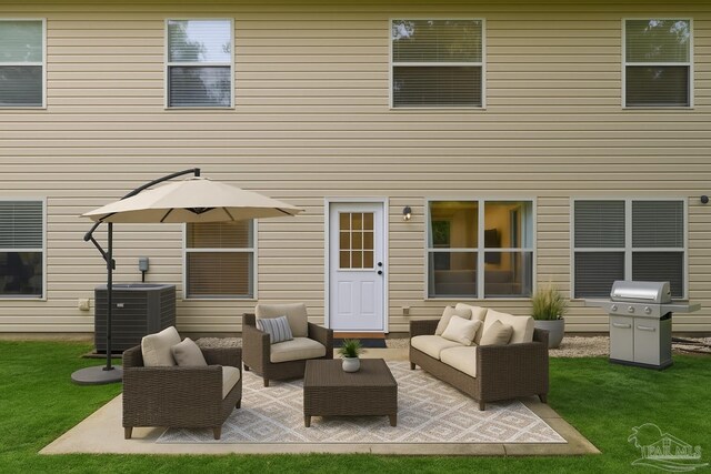 2172 Hadleigh Hills Ct, Navarre, FL 32566 - rear view of property featuring an outdoor hangout area, a patio area, and a lawn