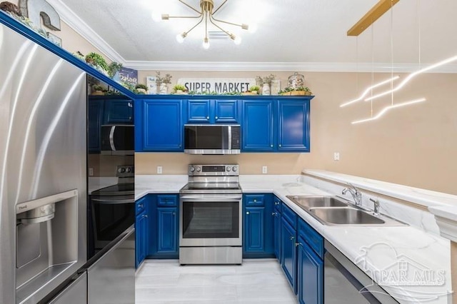 2172 Hadleigh Hills Ct, Navarre, FL 32566 - kitchen with appliances with stainless steel finishes, blue cabinetry, a chandelier, light countertops, and crown molding