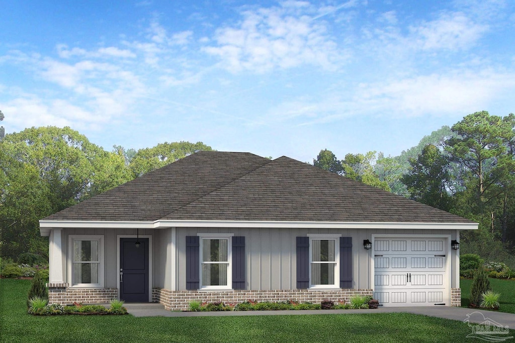 view of front of home with a garage, brick siding, concrete driveway, board and batten siding, and a front yard