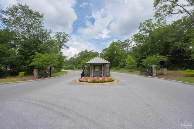 3248 Mountain Laurel Trl, Cantonment, FL 32533 - view of asphalt street with curbs and view of wooded area