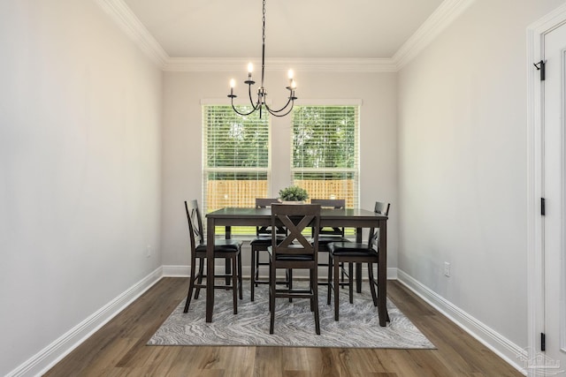 3248 Mountain Laurel Trl, Cantonment, FL 32533 - dining room with a chandelier, wood finished floors, and crown molding