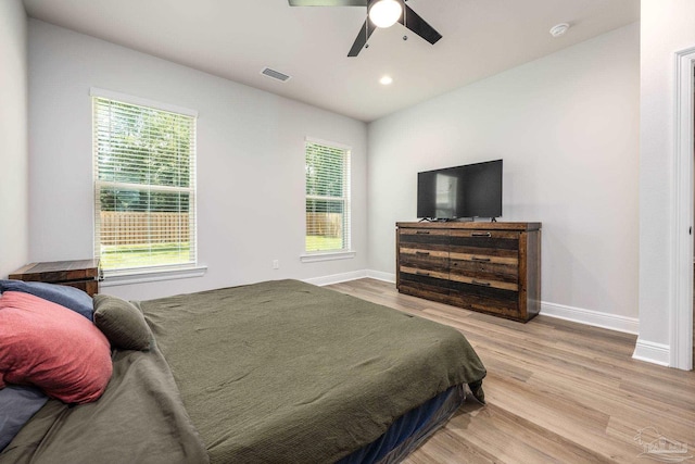 3248 Mountain Laurel Trl, Cantonment, FL 32533 - bedroom with wood finished floors, multiple windows, a ceiling fan, and recessed lighting
