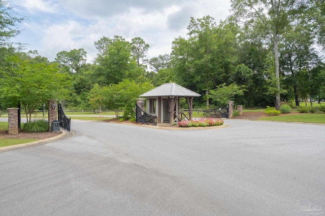 3248 Mountain Laurel Trl, Cantonment, FL 32533 - view of asphalt street with curbs and view of scattered trees