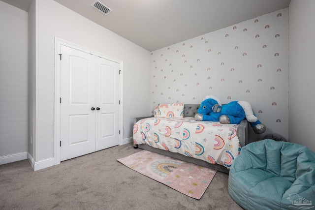 3248 Mountain Laurel Trl, Cantonment, FL 32533 - carpeted bedroom with a closet and baseboards