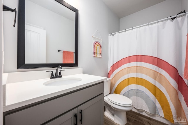 3248 Mountain Laurel Trl, Cantonment, FL 32533 - full bathroom with vanity, wood finished floors, and curtained shower