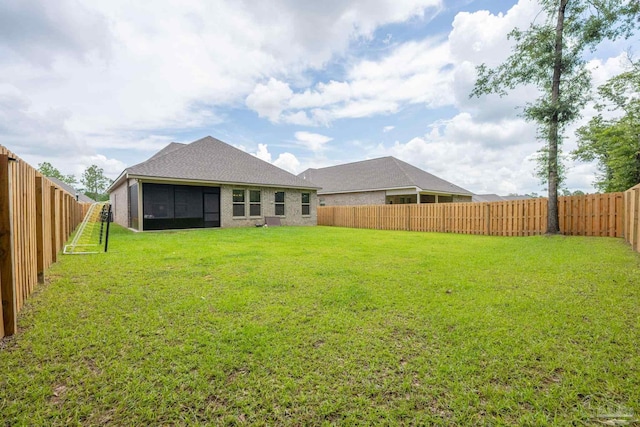 3248 Mountain Laurel Trl, Cantonment, FL 32533 - back of house with a sunroom and a fenced backyard