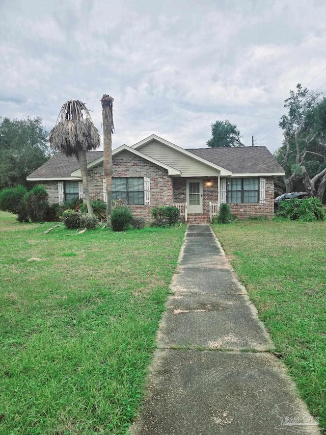 ranch-style house with a front yard