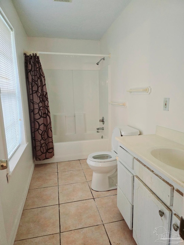 full bathroom with tile patterned flooring, vanity, shower / bath combination with curtain, and toilet