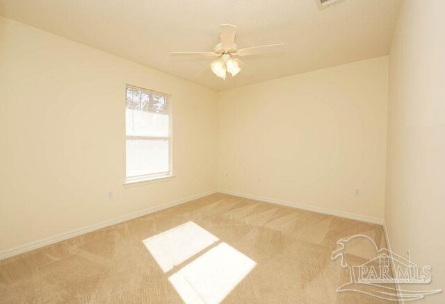 8679 High School Blvd, Navarre, FL 32566 - carpeted empty room with ceiling fan, visible vents, and baseboards