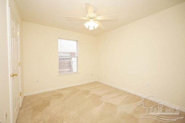 8679 High School Blvd, Navarre, FL 32566 - unfurnished room with a ceiling fan, light carpet, and baseboards