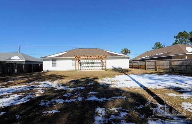 8679 High School Blvd, Navarre, FL 32566 - exterior space with a fenced backyard and a pergola