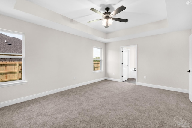 7917 Twin Lake Dr, Milton, FL 32583 - carpeted empty room with a raised ceiling, ceiling fan, and a smoke detector