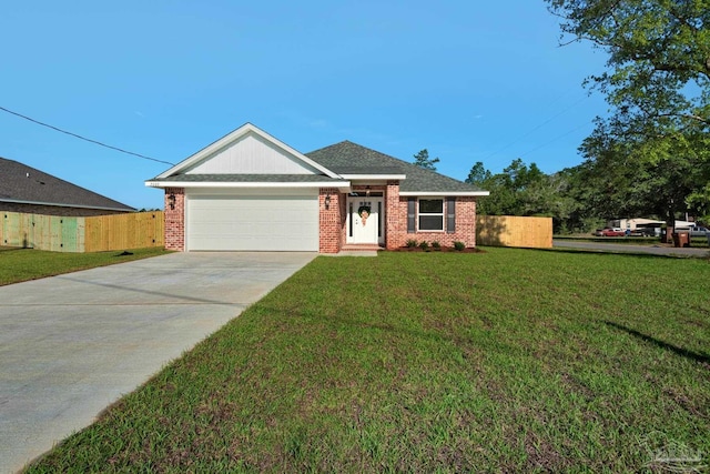 7917 Twin Lake Dr, Milton, FL 32583 - ranch-style house featuring driveway, an attached garage, and brick siding