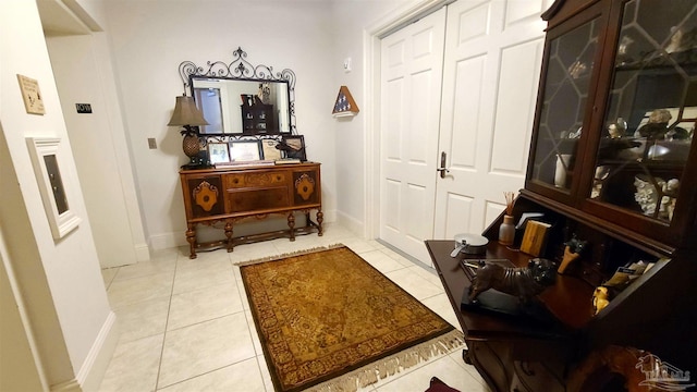 sitting room with light tile patterned floors