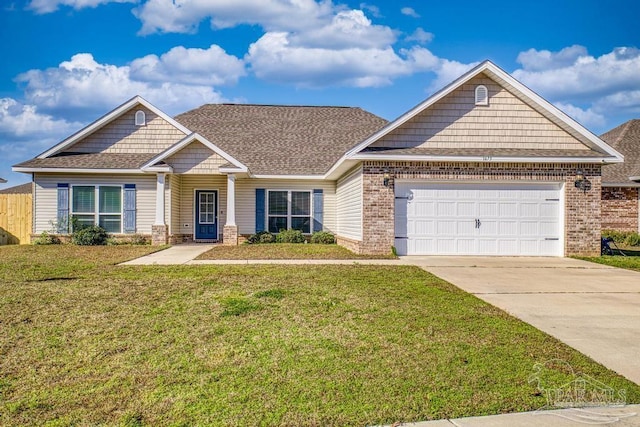 craftsman house with a garage and a front yard