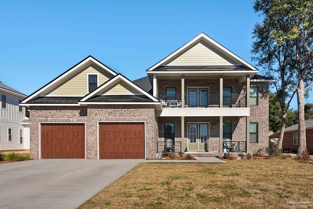 craftsman inspired home with a front yard, a balcony, a porch, and a garage