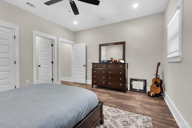 bedroom featuring ceiling fan and wood-type flooring