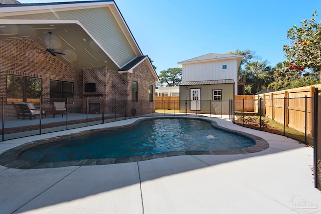 view of pool featuring ceiling fan and a patio