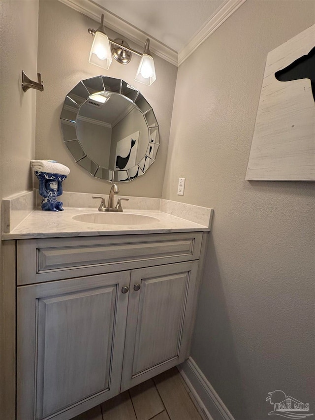 bathroom featuring vanity and crown molding