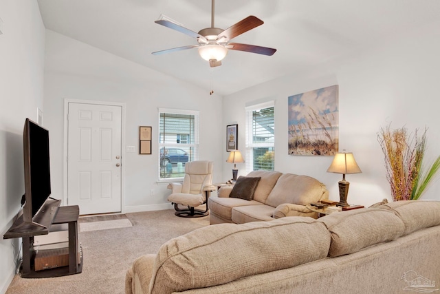 living room with vaulted ceiling, carpet flooring, and ceiling fan