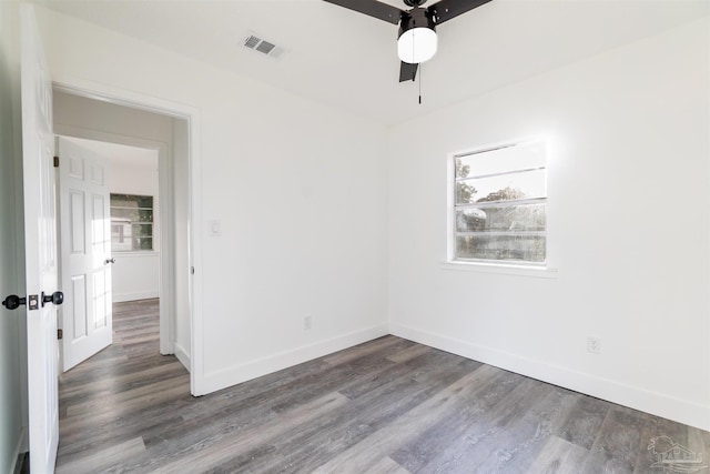 spare room featuring ceiling fan and wood-type flooring