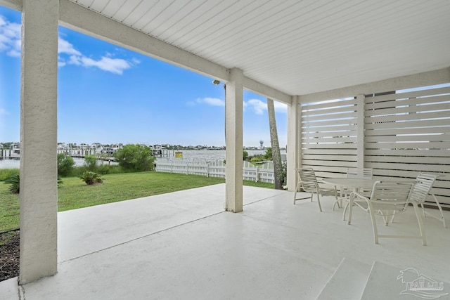 view of patio / terrace with a water view