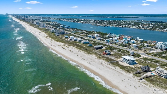 bird's eye view with a water view and a view of the beach