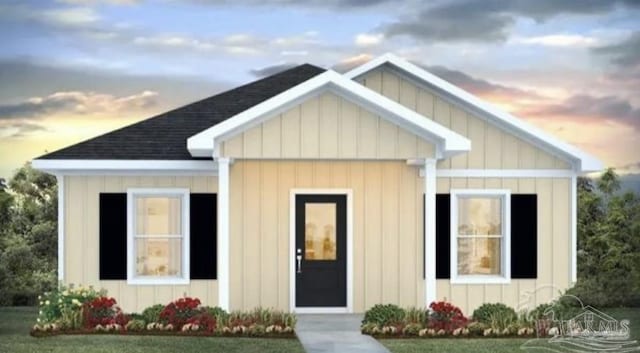 6312 June Bug Dr, Milton, FL 32583 - view of front of house featuring a shingled roof