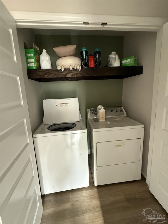 6312 June Bug Dr, Milton, FL 32583 - washroom with separate washer and dryer, laundry area, and dark wood finished floors