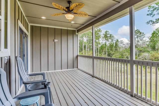 wooden terrace with ceiling fan