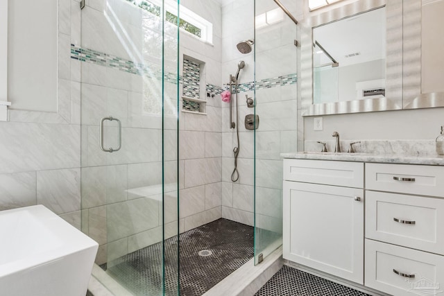 bathroom with vanity and plus walk in shower