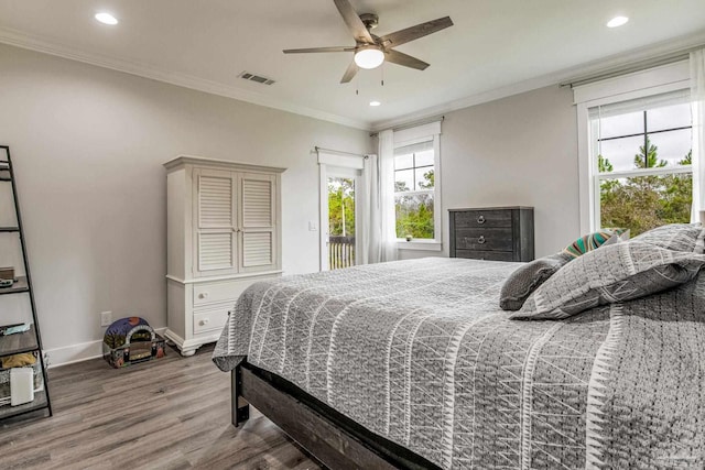 bedroom with hardwood / wood-style flooring, access to outside, ornamental molding, and ceiling fan