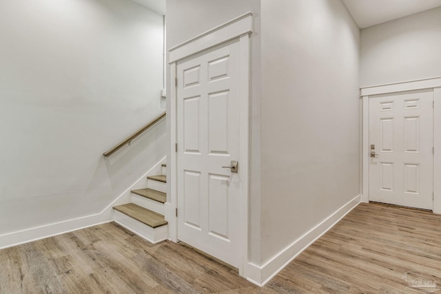 foyer with light hardwood / wood-style floors