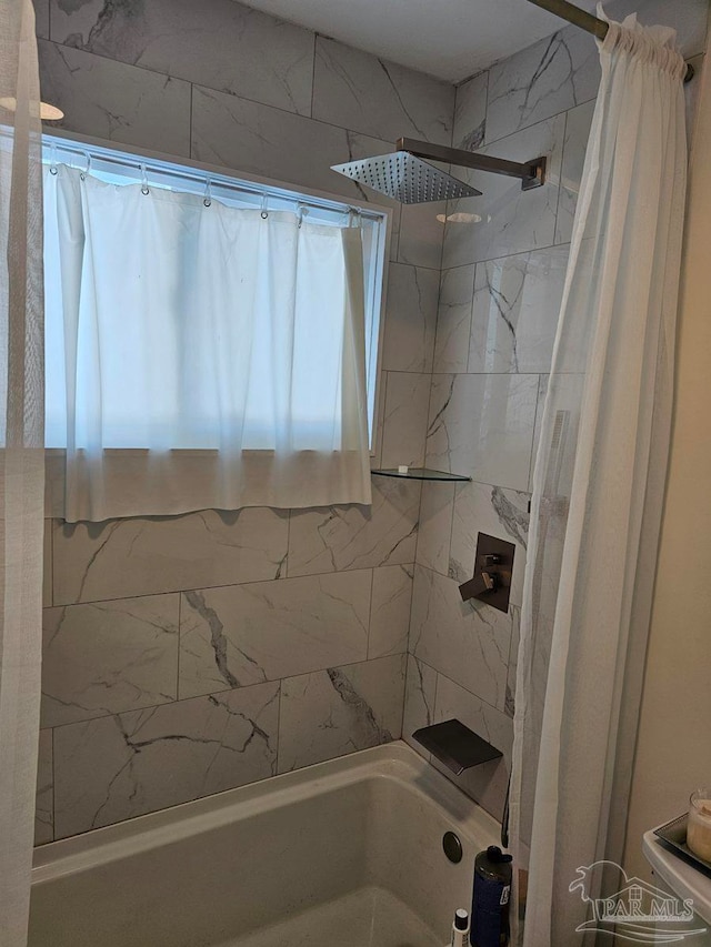 full bath with shower / bathtub combination with curtain