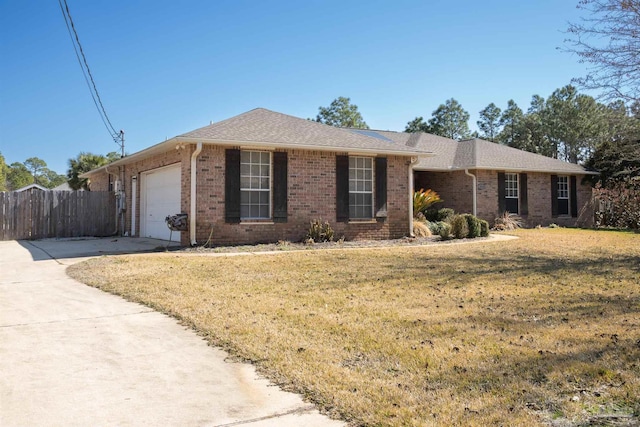 single story home with brick siding, a front yard, driveway, an attached garage, and fence