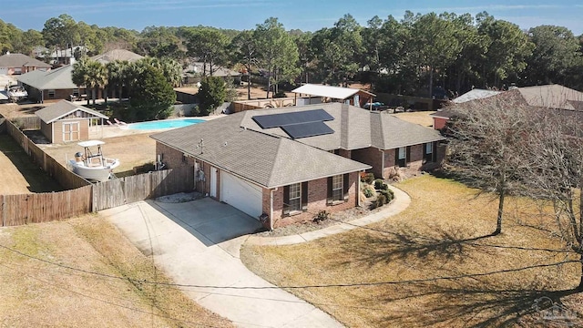 birds eye view of property with a residential view