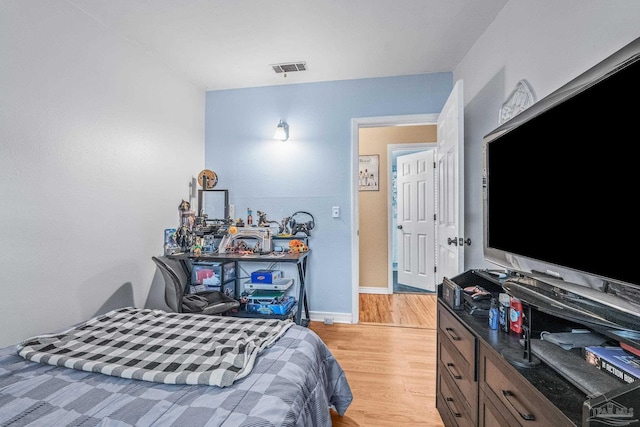 bedroom featuring light hardwood / wood-style floors