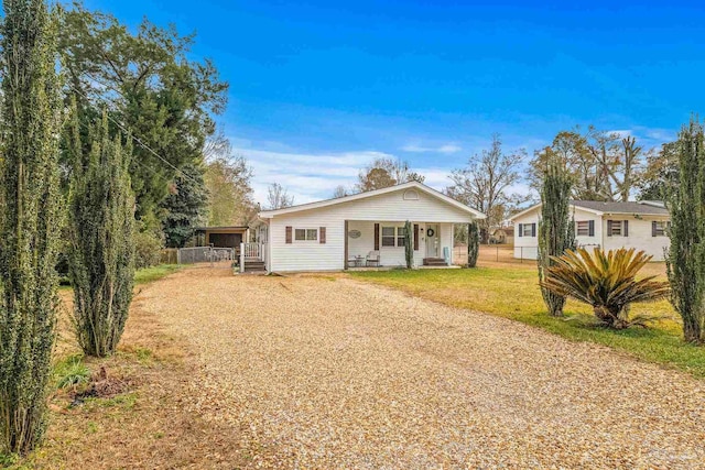 view of front of property with a front lawn and a porch