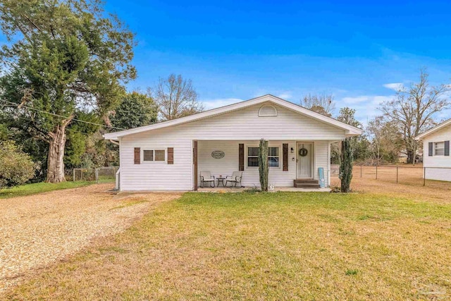 view of front of home featuring a porch and a front lawn