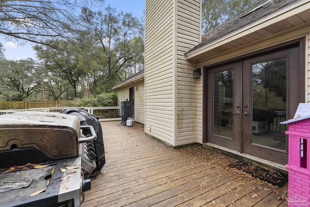 wooden terrace featuring french doors