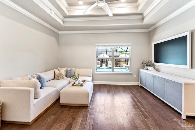 7956 Huntington Creek Ln, Pensacola, FL 32526 - living room with crown molding, a tray ceiling, ceiling fan, and dark wood-type flooring