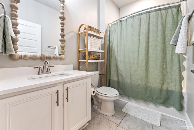 7956 Huntington Creek Ln, Pensacola, FL 32526 - full bath featuring toilet, vanity, shower / bath combo with shower curtain, and tile patterned flooring