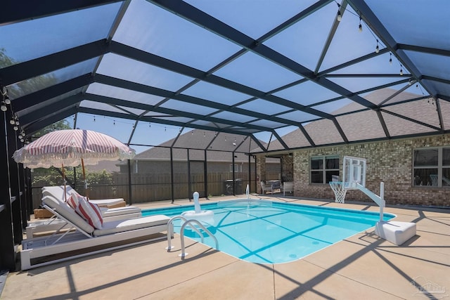 7956 Huntington Creek Ln, Pensacola, FL 32526 - view of pool featuring a patio area, fence, a fenced in pool, and glass enclosure