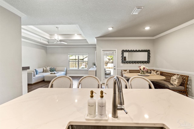 7956 Huntington Creek Ln, Pensacola, FL 32526 - kitchen with open floor plan, a sink, crown molding, and a ceiling fan