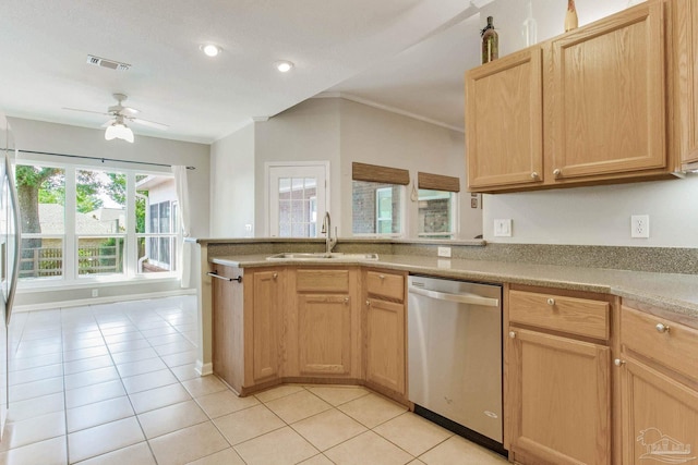 kitchen featuring ceiling fan, light tile patterned floors, sink, stainless steel dishwasher, and light brown cabinetry