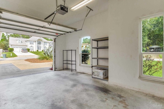 garage featuring a garage door opener